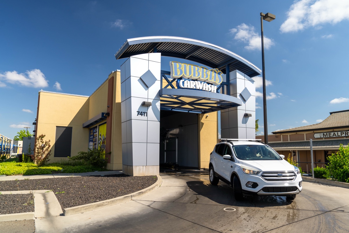 Bubba's Express Car Wash Citrus Heights location exterior with car entering the tunnel