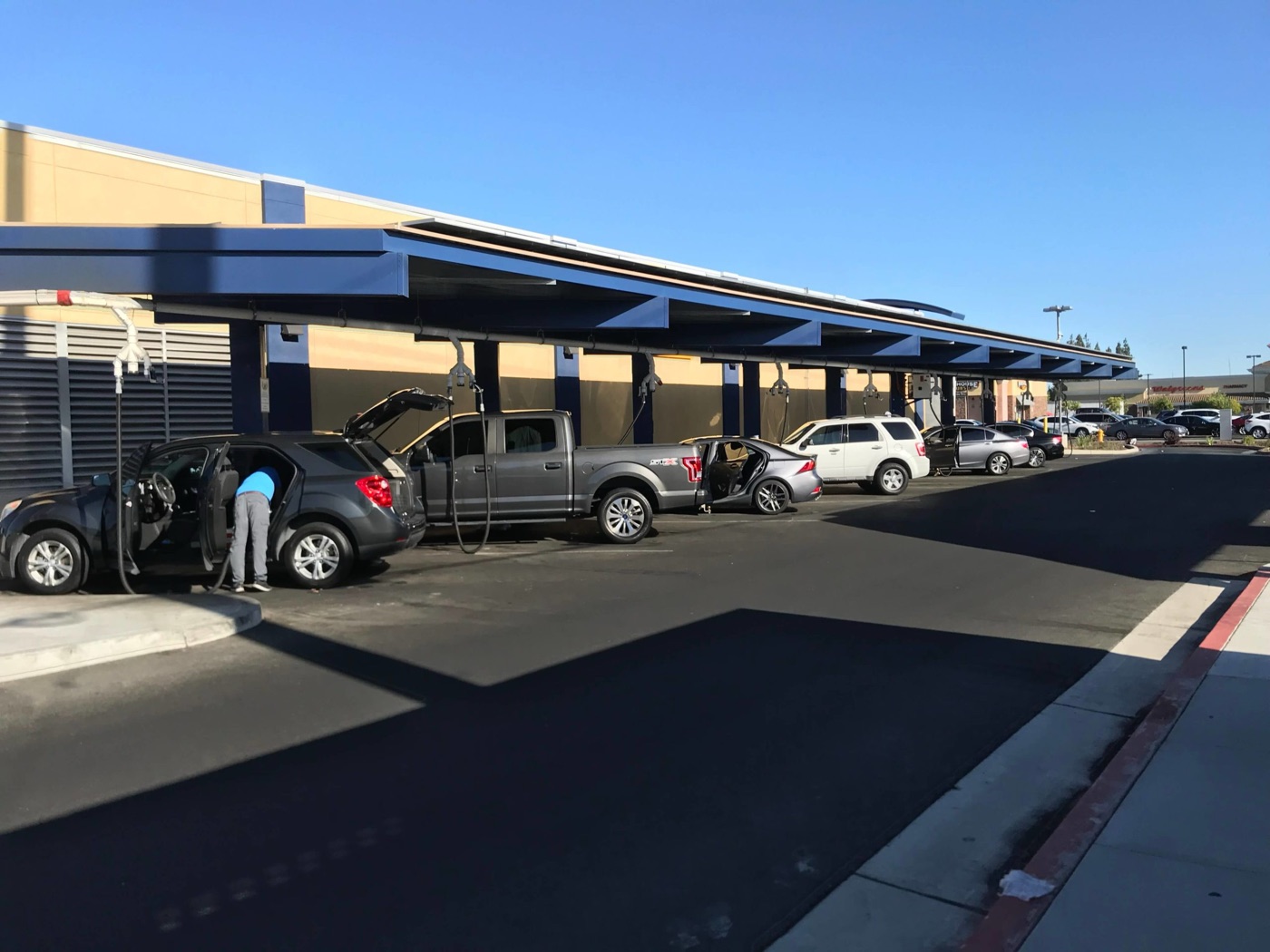 Customers using the free vacuum stations at Bubba's Express Car Wash Stockton