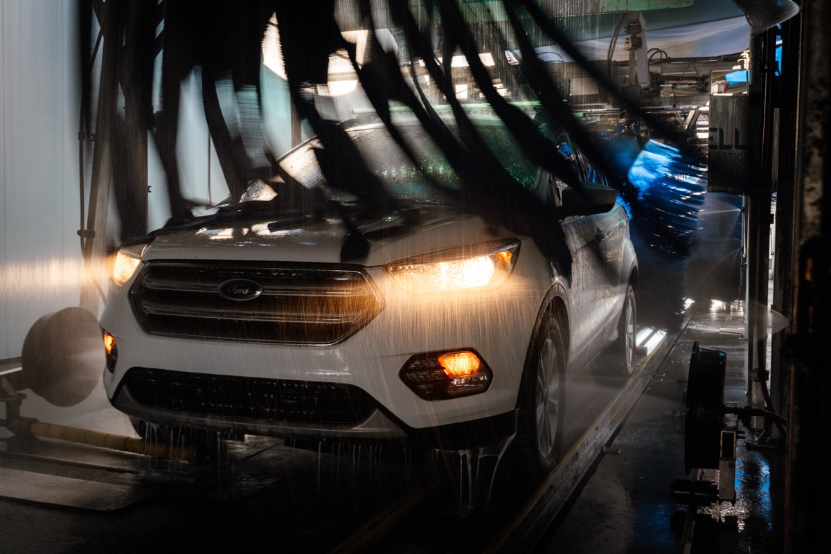 Vehicle moving through the wash tunnel at Bubba's Express Car Wash