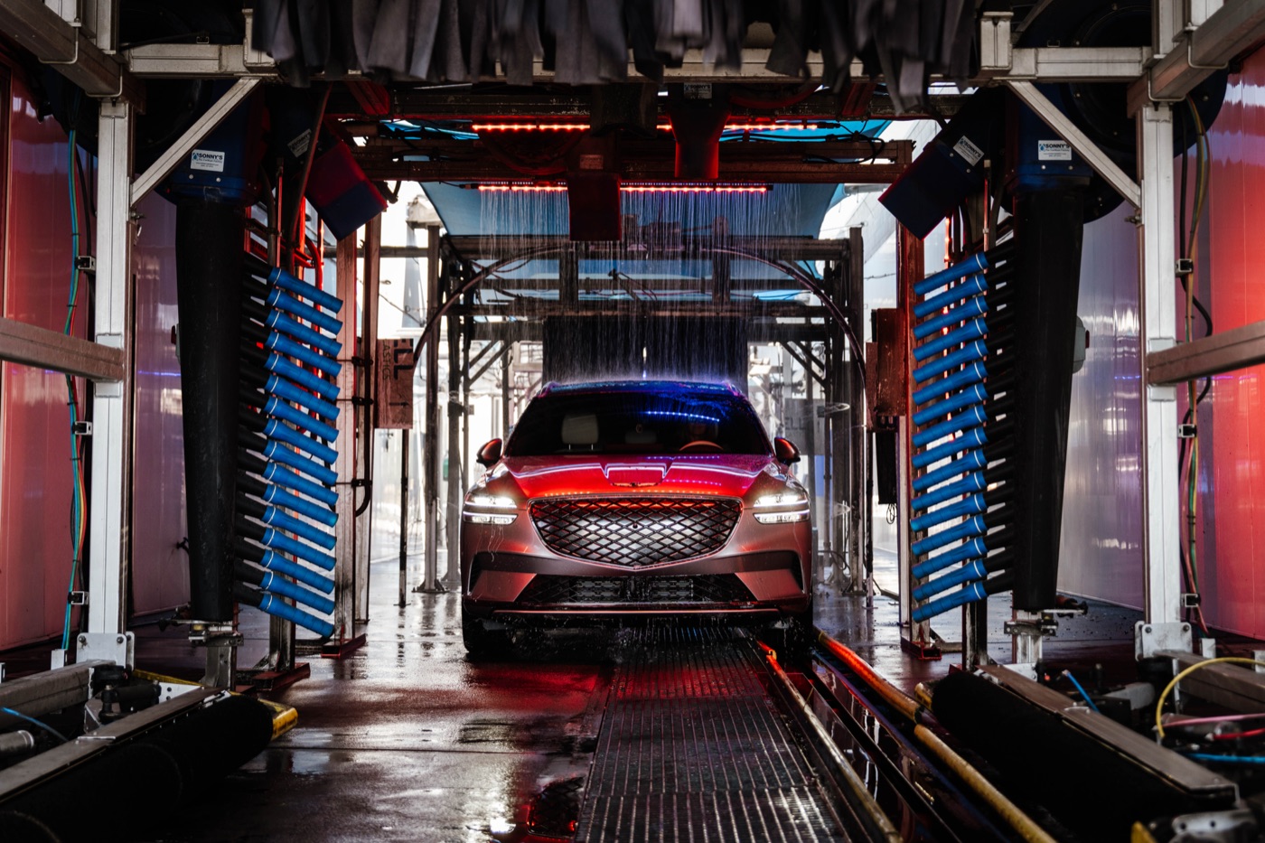 Car glowing inside the wash tunnel at Bubba's Express Car Wash