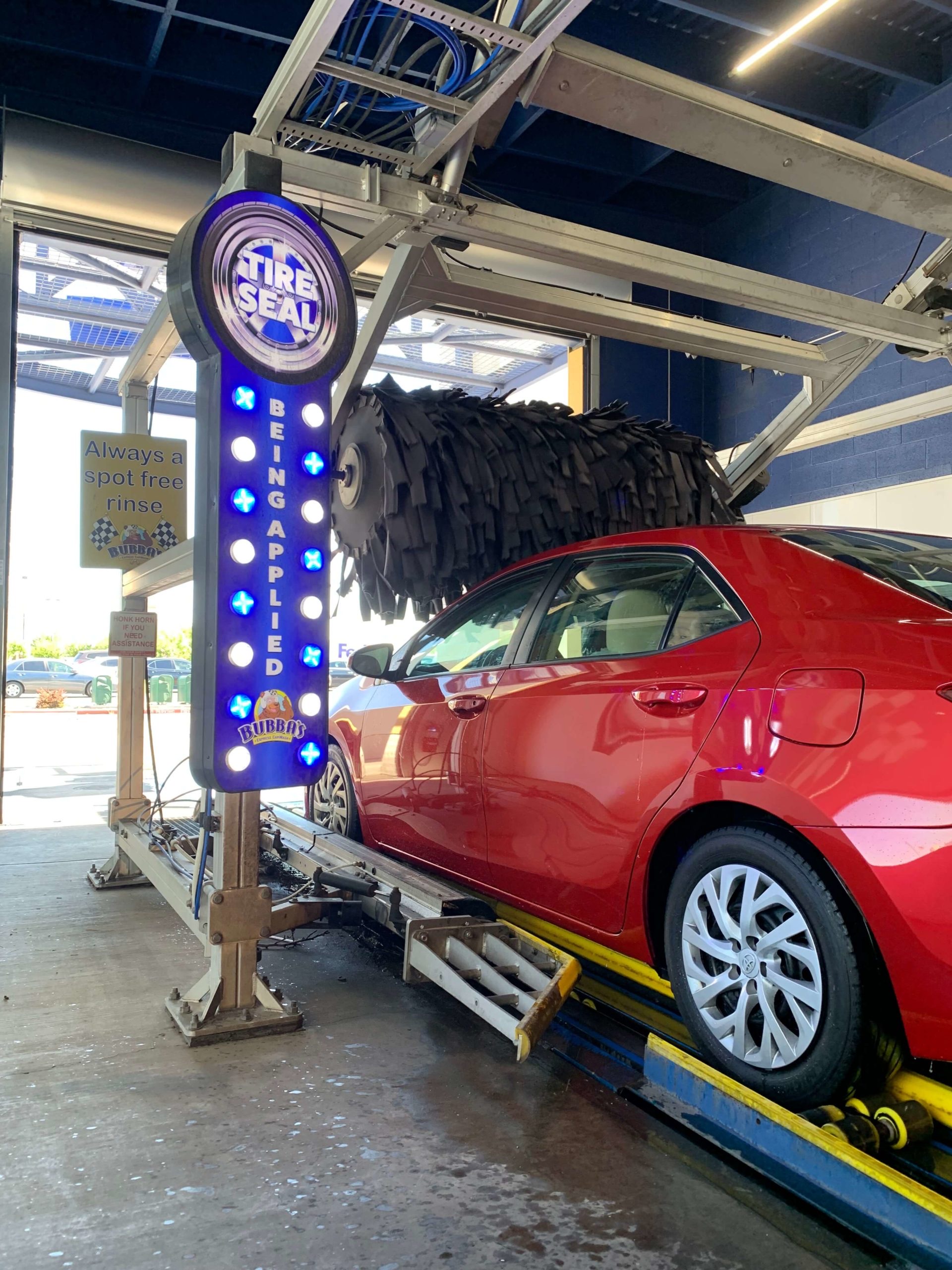 Car going through the wash at Bubba's Express Car Wash
